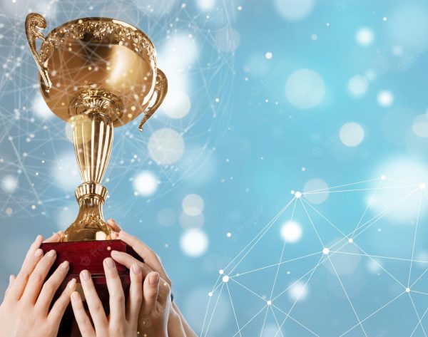 winning-team-raise-trophy winning-team-raise-trophy